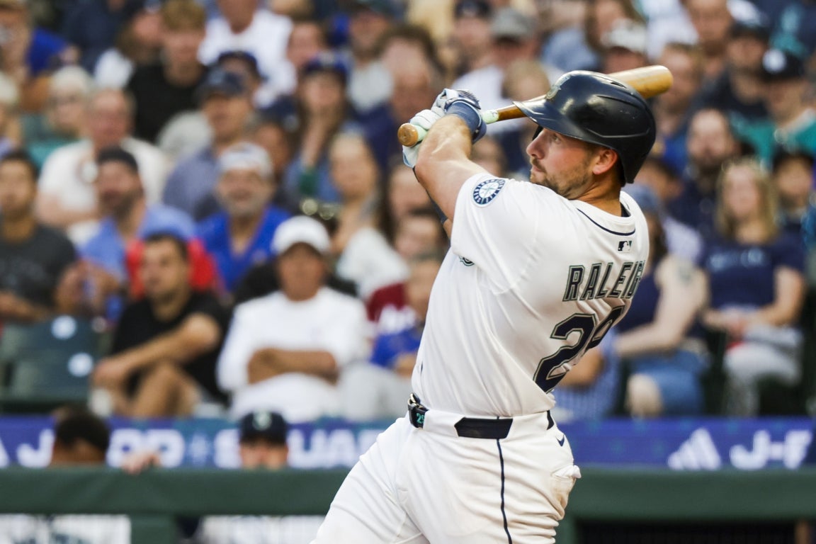 Incredible photos capture Cal Raleigh's torrid home run pace