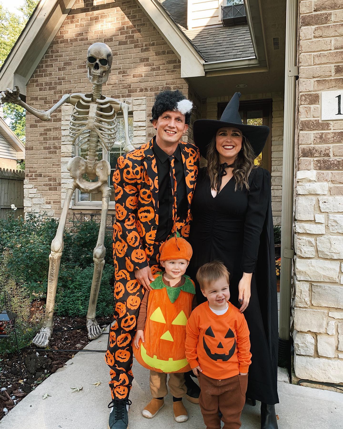 family with giant skeleton