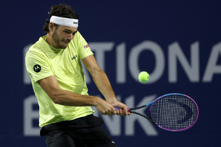 Fritz beats rain Carballes Baena to advance in Toronto Fritz beats rain Carballes Baena to advance in Toronto