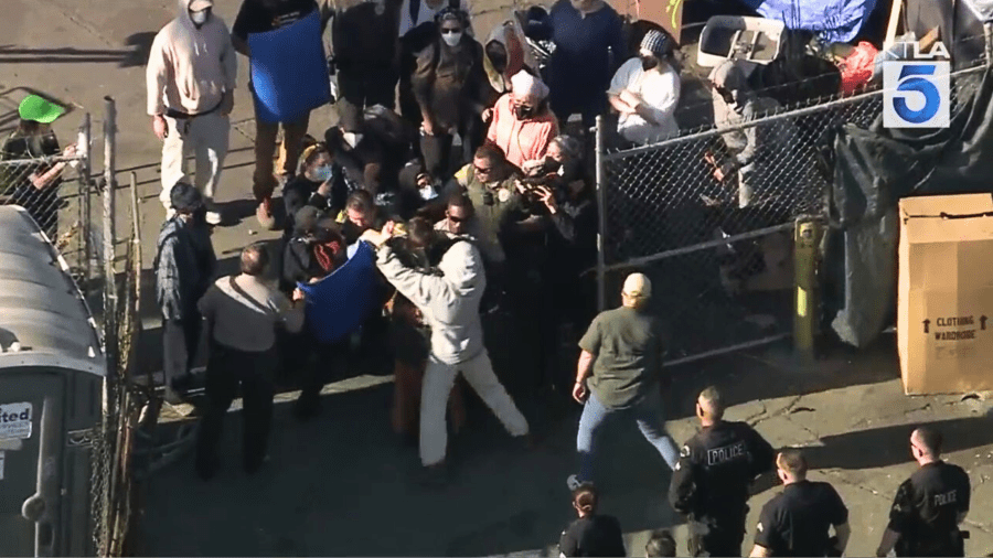 Protesters clash with authorities during L.A. homeless encampment sweep