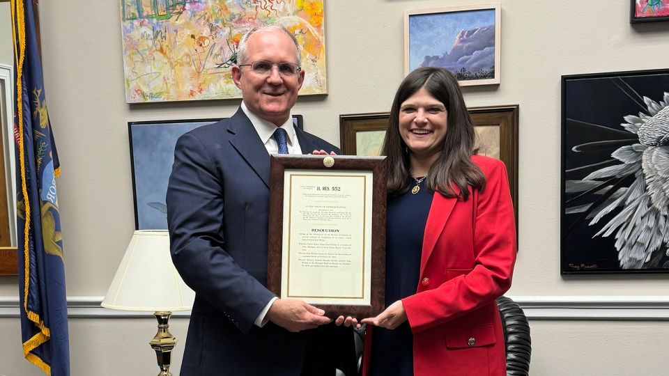 Paul Whelan with Michigan Rep. Haley Stevens being presesnted with a copy of the resolution calling for his release. - Courtesy Paul Whelan