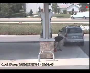 Car Parked at Gas Station Rolls Into Pond