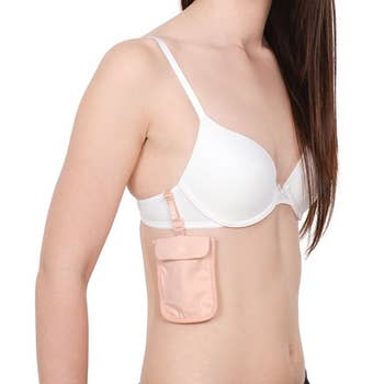 the small pouch attached to the side of a bra