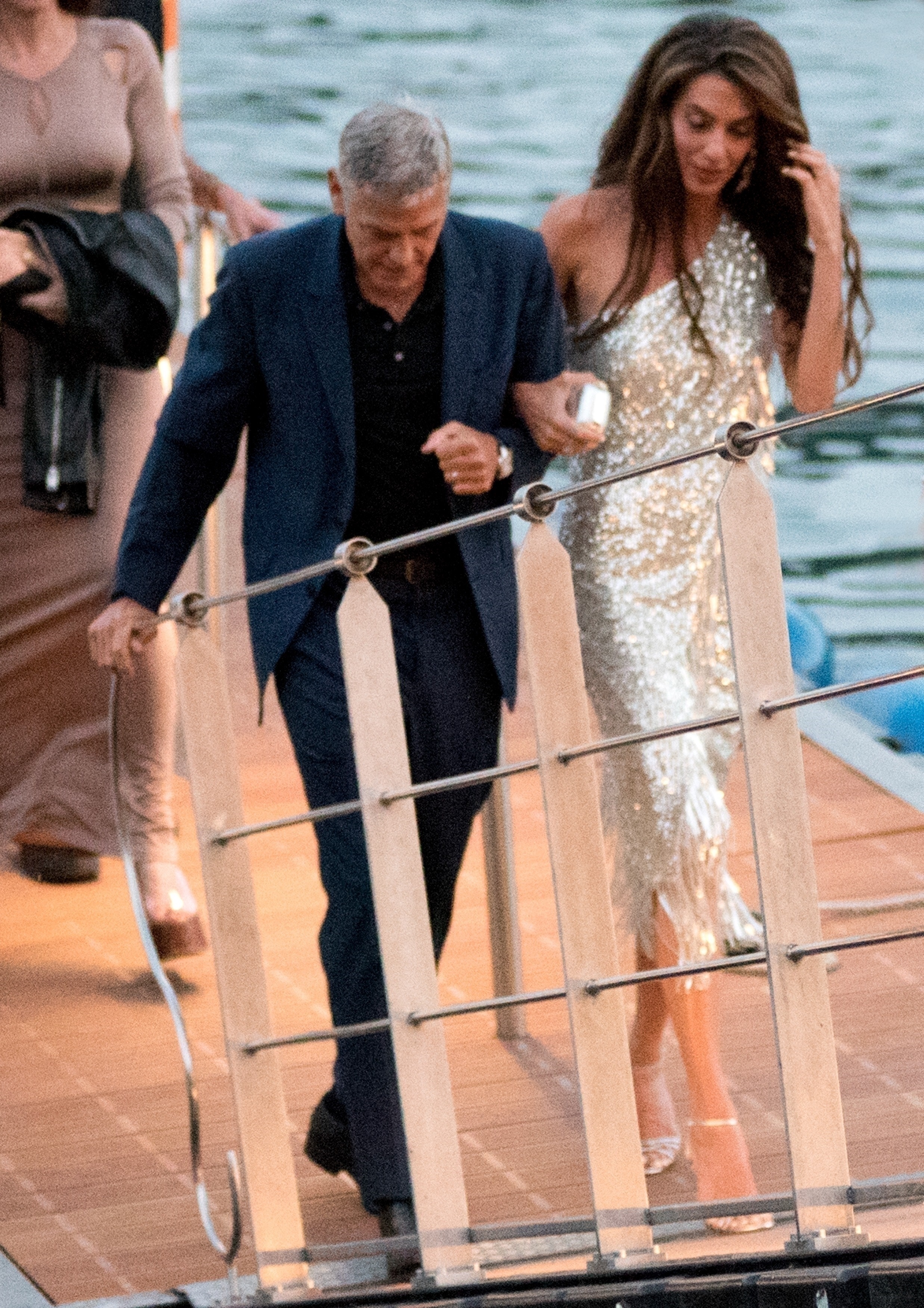 Amal Clooney steps out in silver sequins for Lake Como date night with