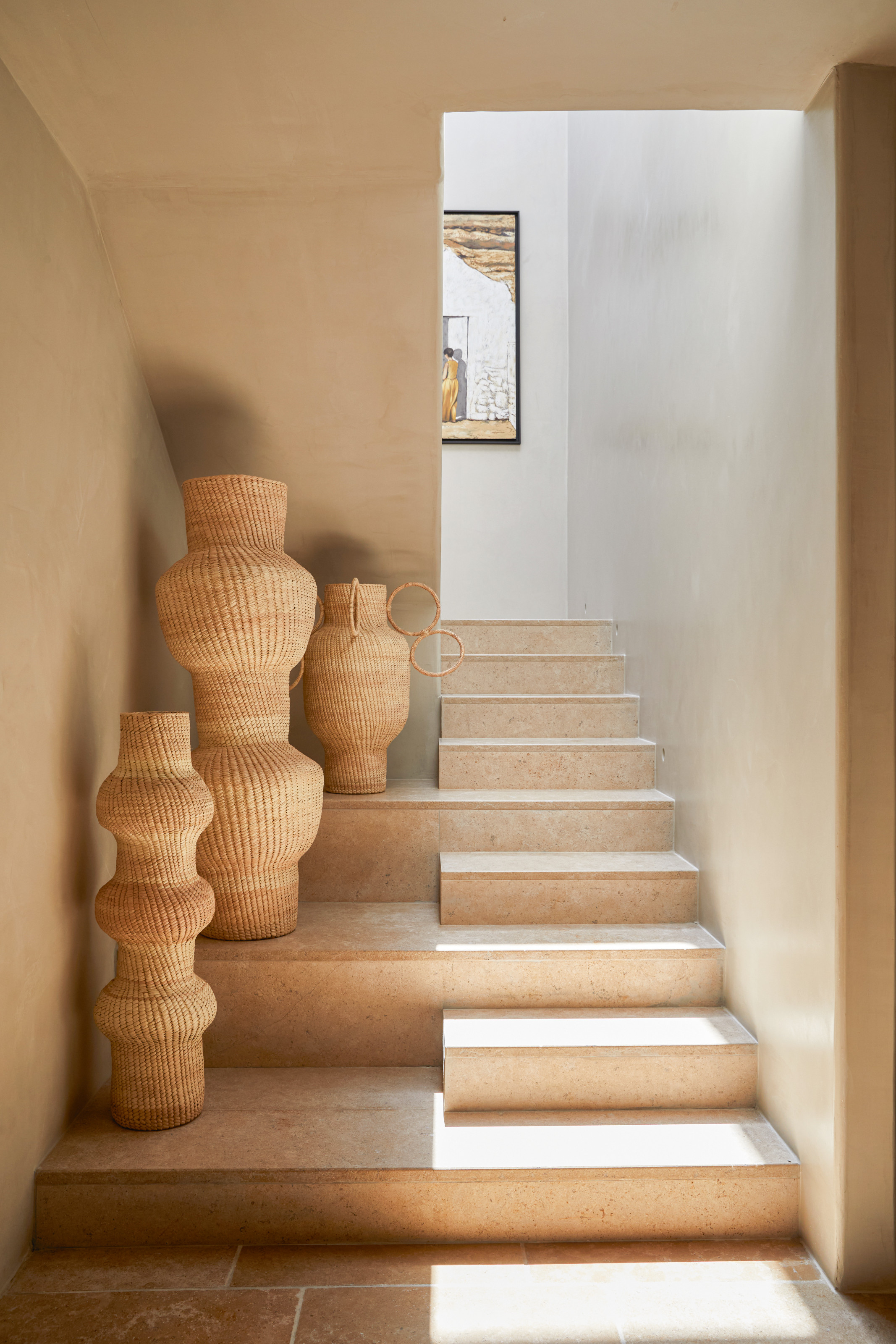 Stone staircase with rattan sculptures