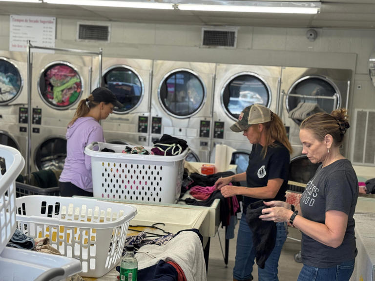 Volunteers launder clothing and other items recovered after the July 4 flooding along the Guadalupe River. A Facebook group has helped reunite flood victims with some of their lost possessions.