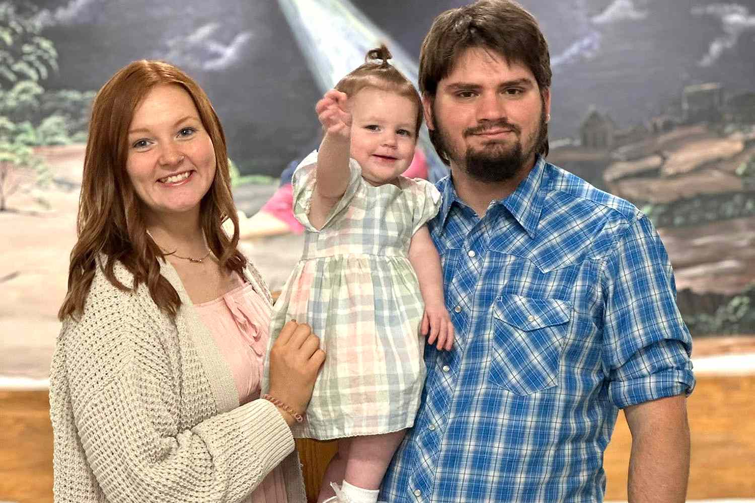 Woman Mourning Her Husband, 22, and Their 1YearOld Daughter, Who Died(00)