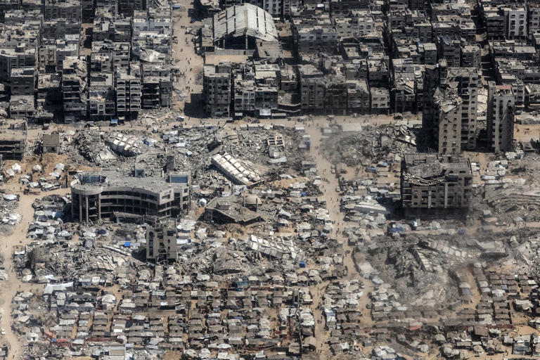 The ruins of Maqoussi Mosque and the Ministry of Economy in Gaza, seen from a Jordanian aid flight on July 30.