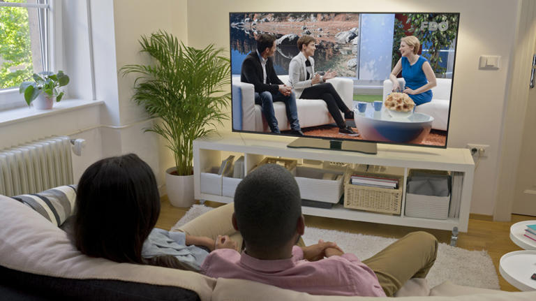 Couple watching show on TV