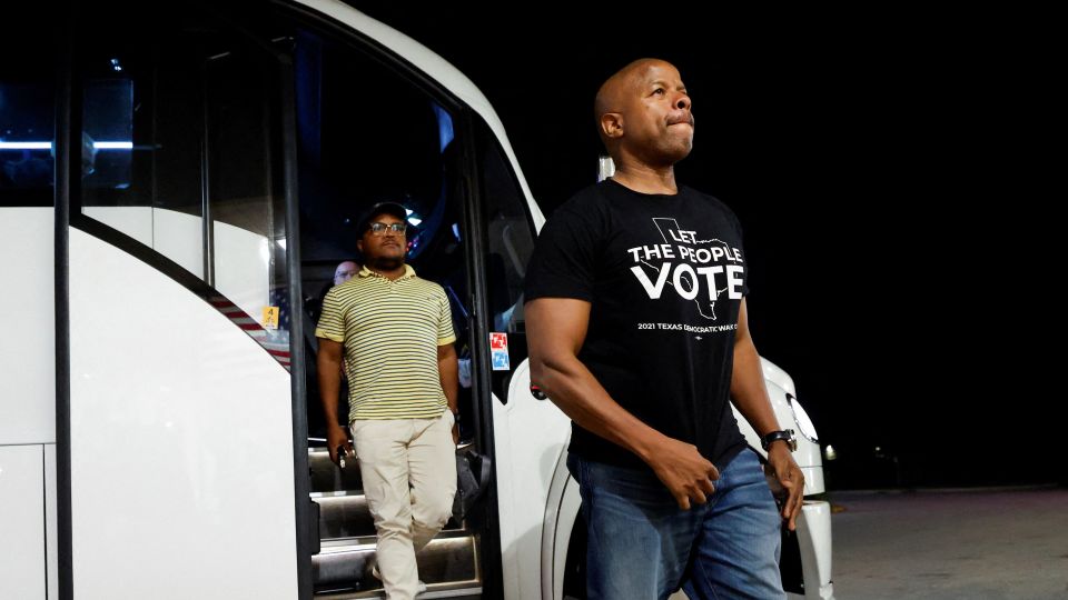 Democratic lawmakers from Texas arrive for a news conference with Illinois Governor J.B. Pritzker, after leaving their state to deny Republicans the quorum needed to redraw the state's 38 congressional districts, in Carol Stream, Illinois, August 3, 2025. - Kamil Krzaczynski/Reuters