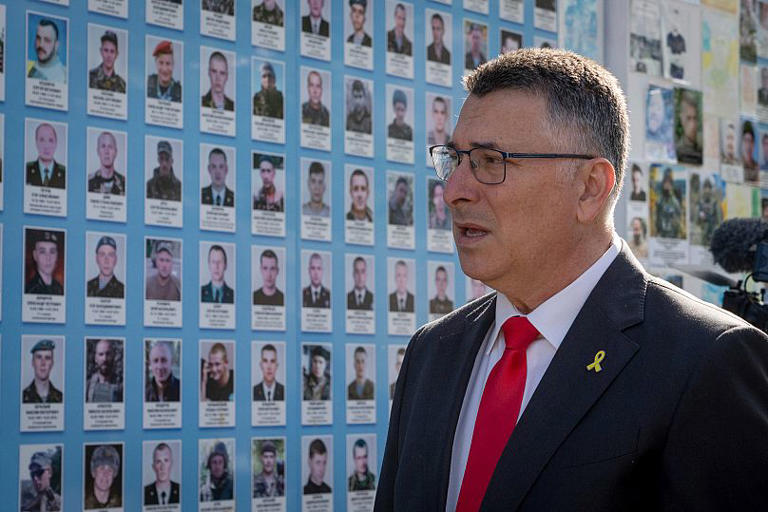 Israel's Foreign Minister Gideon Sa'ar attends a flower laying ceremony at the Memory Wall of Fallen Defenders of Ukraine in Kyiv, 23 July, 2025 AP Photo