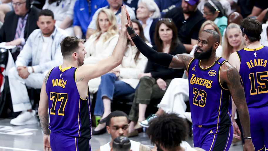Apr 9, 2025; Dallas, Texas, USA; Los Angeles Lakers guard Luka Doncic (77) celebrates with Los Angeles Lakers forward LeBron James (23) during the fourth quarter against the Dallas Mavericks at American Airlines Center. Mandatory Credit: Kevin Jairaj-Imagn Images | Kevin Jairaj-Imagn Images