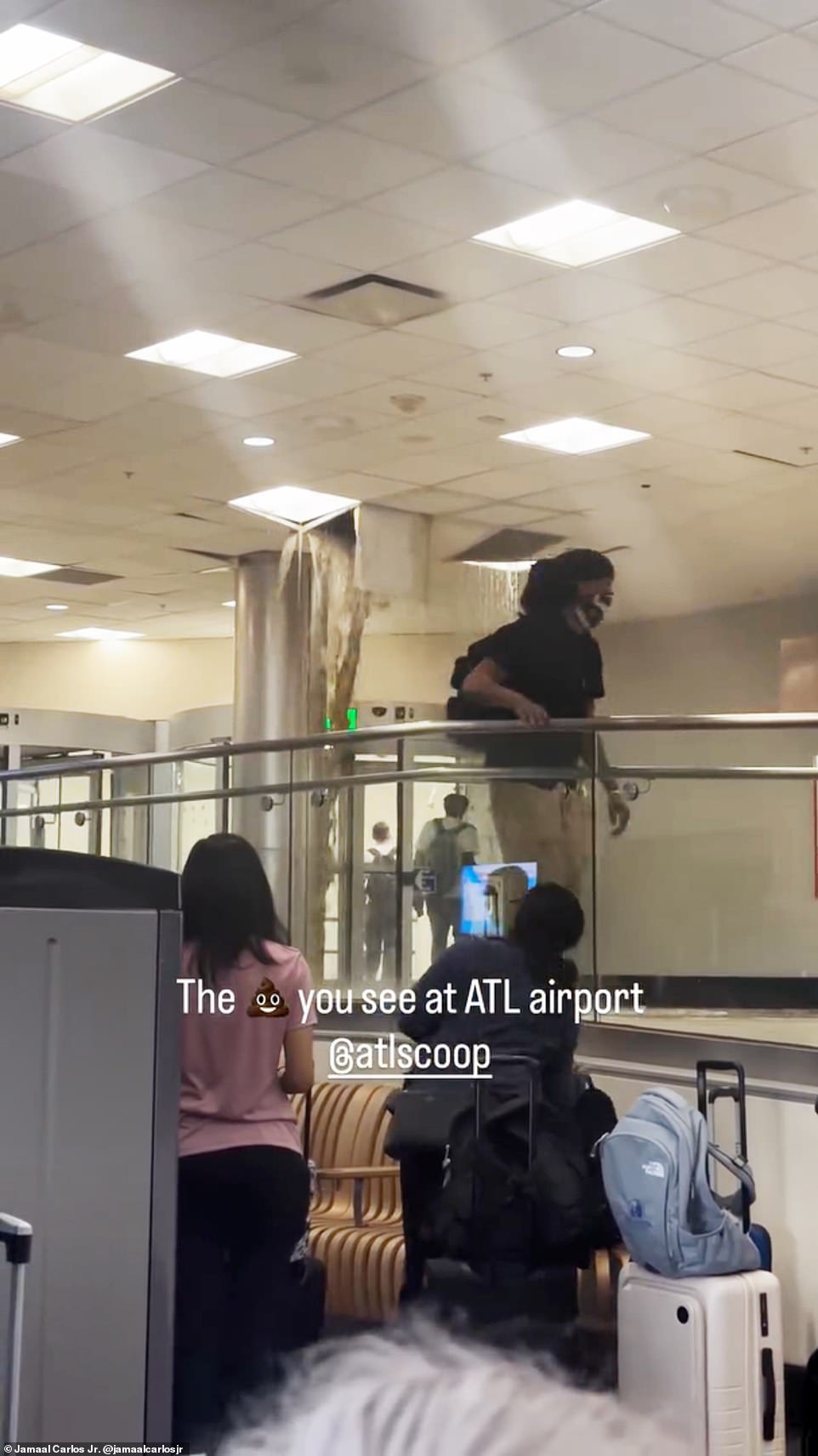 Brown sewage explodes from ceiling at America's busiest airport