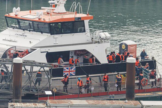 Migrants Arrive On UK Shores After Crossing The Channel In Small Boats