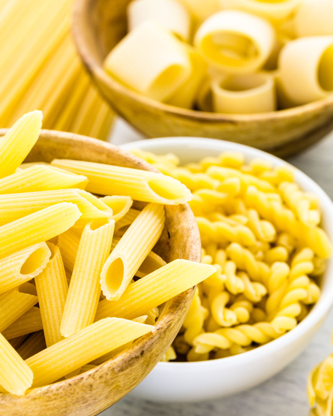 dry pasta in bowls