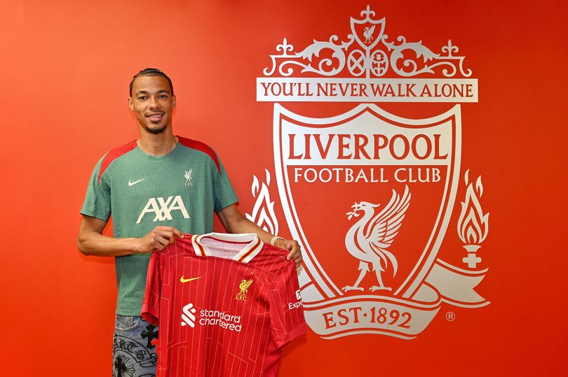 Hugo Ekitike poses for photos after he signs for Liverpool Football Club on July 23, 2025 in London, England