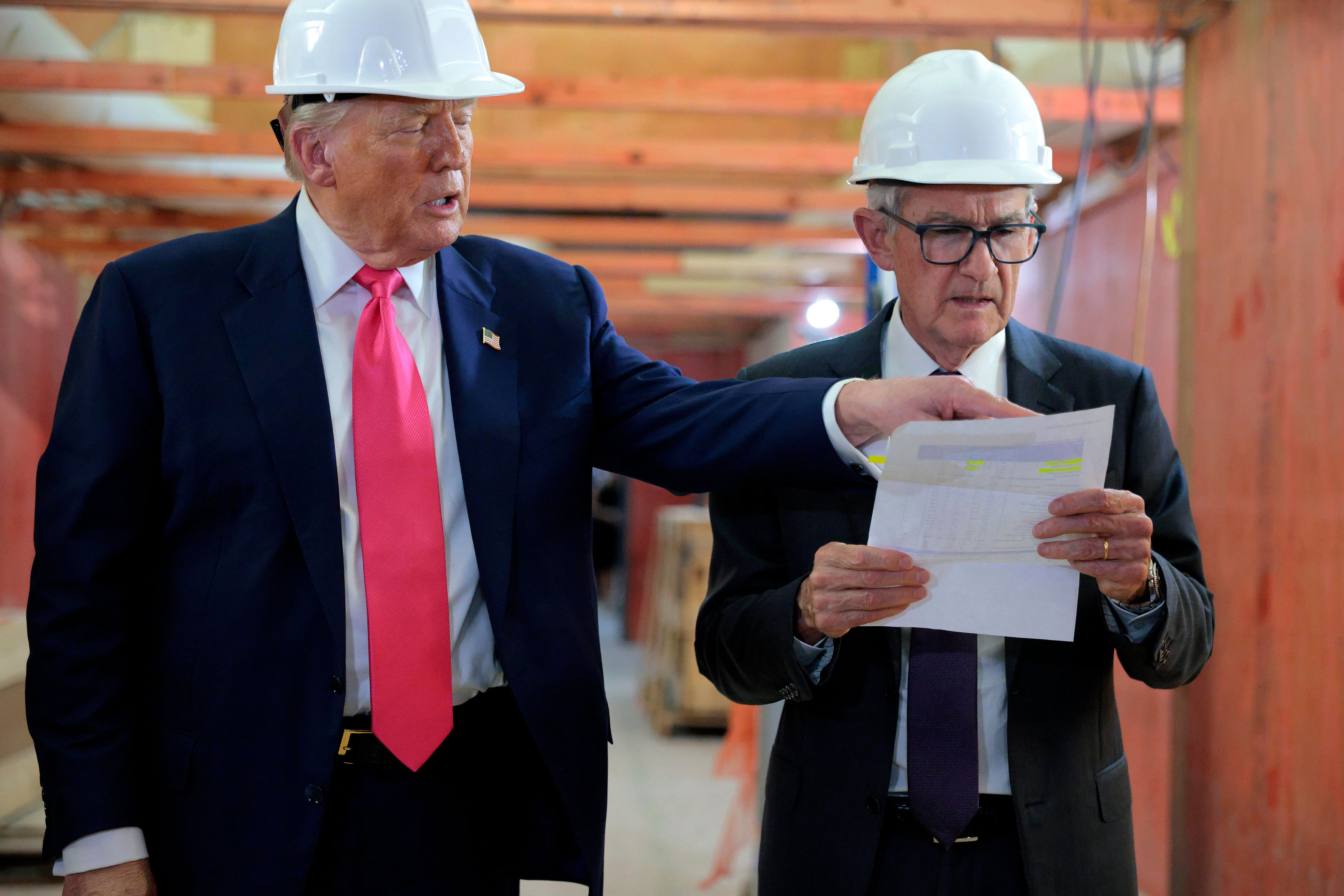 President Donald Trump and Federal Reserve Chair Jerome Powell tour the Federal Reserve's $2.5 billion headquarters renovation project on July 24, 2025 in Washington, DC. / Credit: Chip Somodevilla / Getty Images