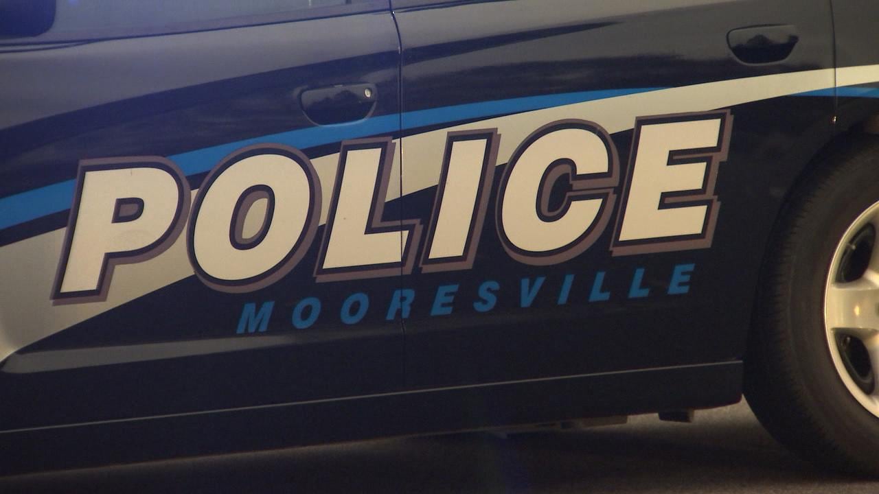 Mooresville man arrested, accused of setting car on fire with person inside