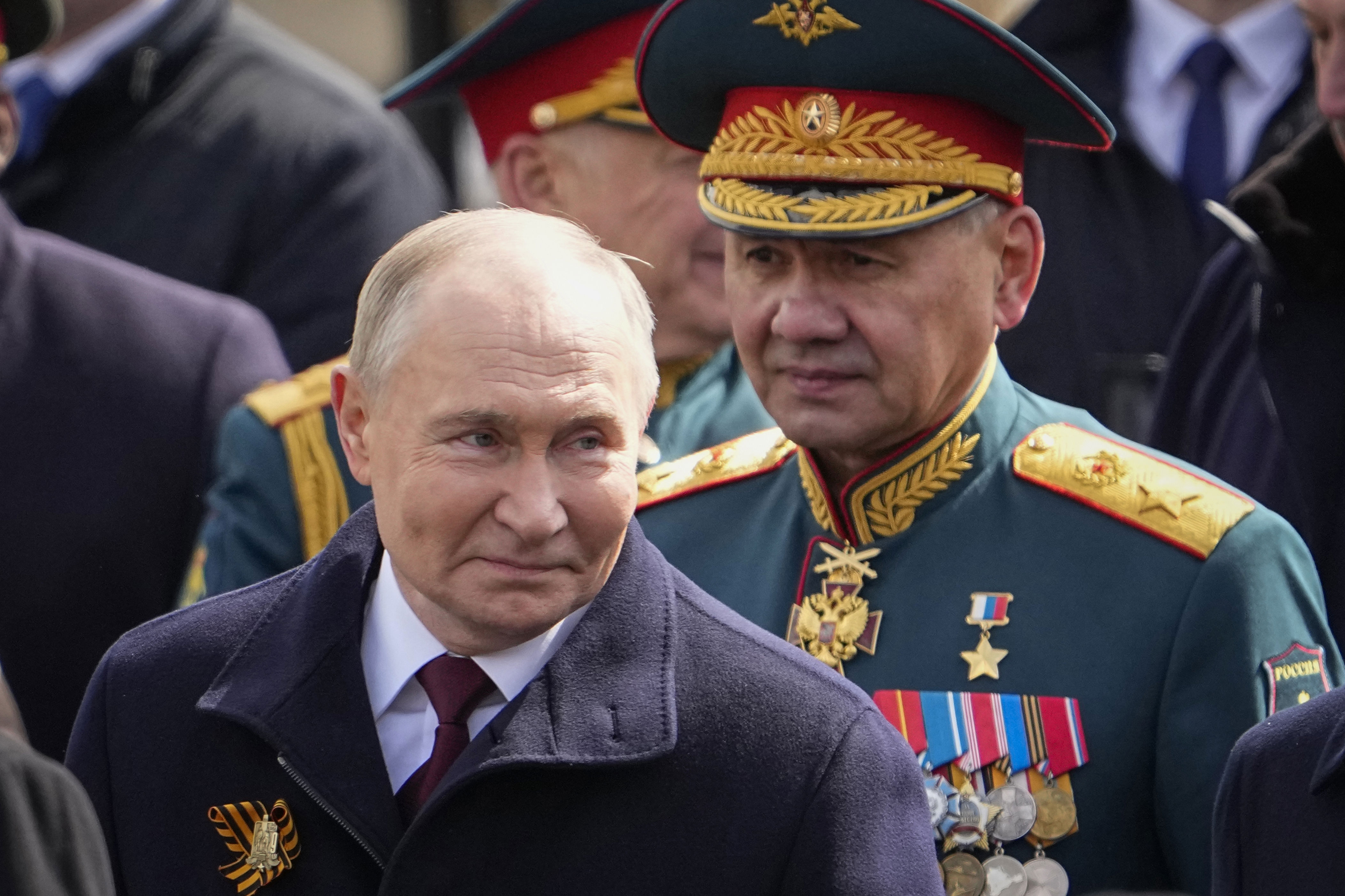 Russian President Vladimir Putin, left, and Russian Defense Minister Sergei Shoigu leave Red Square after the Victory Day military parade last year in Moscow.
