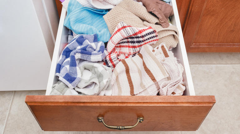 You're Probably Storing Your Kitchen Towels Wrong (But Here's An Easy Fix)
