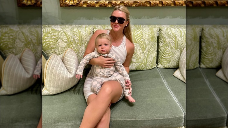 Karoline Leavitt in Palm Beach posing for a photo with her son