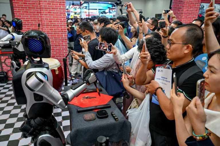 Organisers said the forum involved more than 800 companies, showcasing over 3,000 products -- the undeniable crowd pleasers being the humanoid robots. Photo: - / AFP Source: AFP
