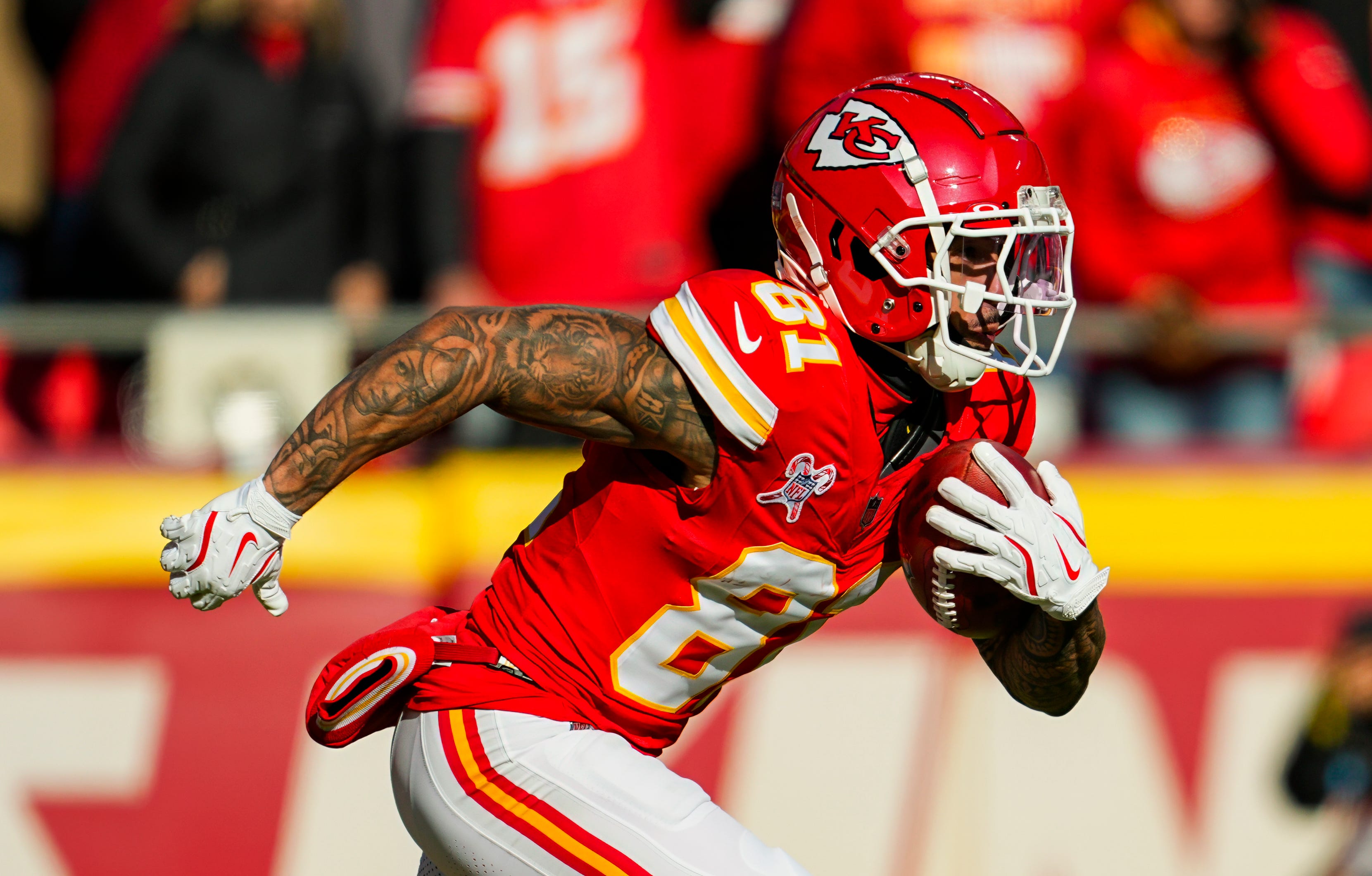 Dec 21, 2024; Kansas City, Missouri, USA; Kansas City Chiefs wide receiver Nikko Remigio (81) returns a kickoff during the first half against the Houston Texans at GEHA Field at Arrowhead Stadium. Mandatory Credit: Jay Biggerstaff-Imagn Images