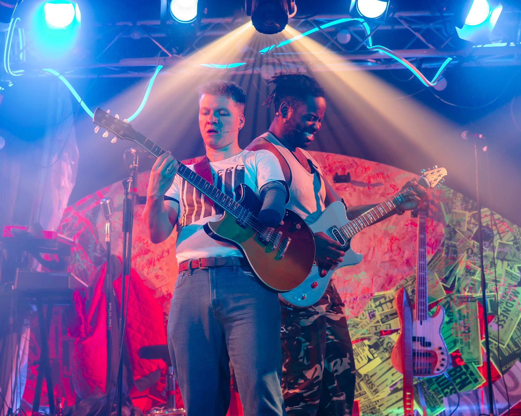 Max Runham and Tendai Humphrey Sitima as Simon Parkes and Johnny Lawes (Danny Kaan)