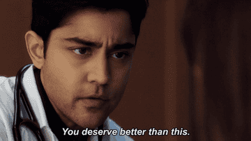 A concerned person in a white coat says, "You deserve better than this," to someone off-screen