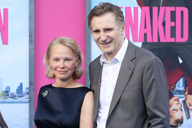 CHARLY TRIBALLEAU/AFP via Getty From Left: Pamela Anderson and Liam Neeson in New York City on July 28, 2025