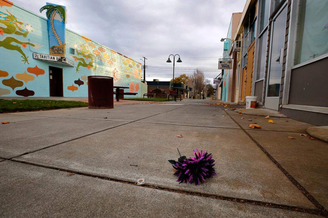 Michael Anthony Perkins, 36, was shot and killed near the breezeway of Lee's Tahitian Restaurant on the Jadwin Avenue side of the Uptown center.