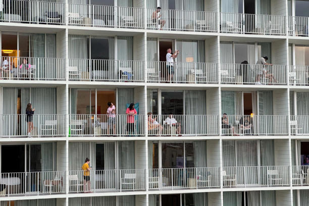 People looked toward Waikiki Beach in Honolulu, after authorities warned of the possibility of tsunami waves.