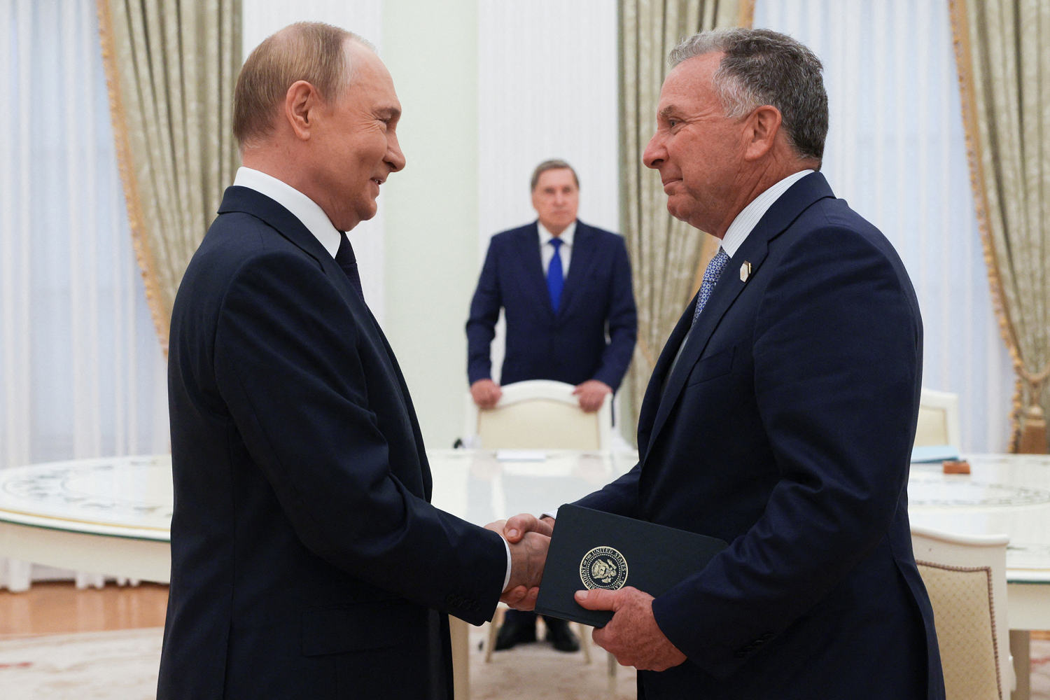 Russia's President Vladimir Putin greets U.S. Special Envoy Steve Witkoff prior to their talks in Moscow on August 6. (Gavriil Grigorov / Pool via AFP-Getty Images)