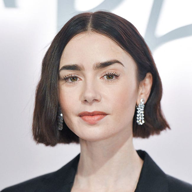 Soft Textures: Enhancing Natural Beauty - A versatile, layered hairstyle designed to soften and frame various face shapes by maximizing gentle volume and seamless transitions, highlighting unique features with grace.