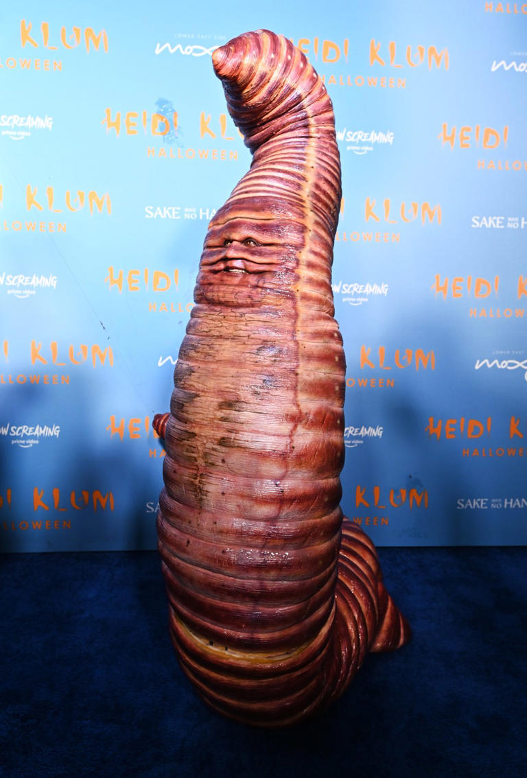 Klum, who famously dressed as a giant worm for Halloween 2022, claimed that “there are pills [to get rid of them]” that “have all of these herbs.” Getty Images for Heidi Klum