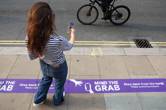 A purple line is installed outside Currys on Oxford Street in London as part of the retailer’s ‘Mind the Grab’ campaign. Picture date: Wednesday August 6, 2025. PA Photo. Photo credit: Kieran Cleeves/PA Media Assignments