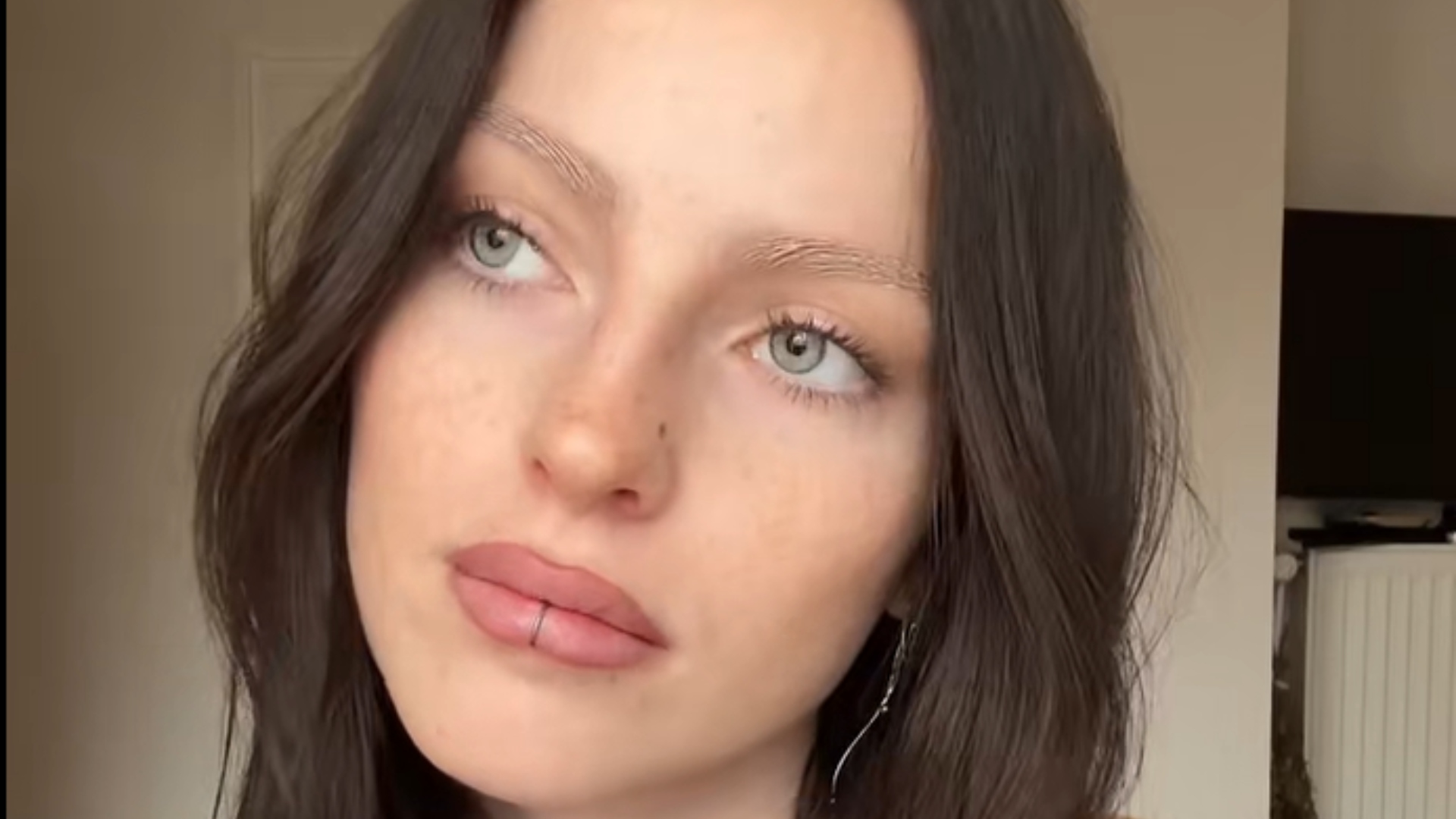 Erasing Your Eyebrows? The New Beauty Trend That's Dividing Social Media