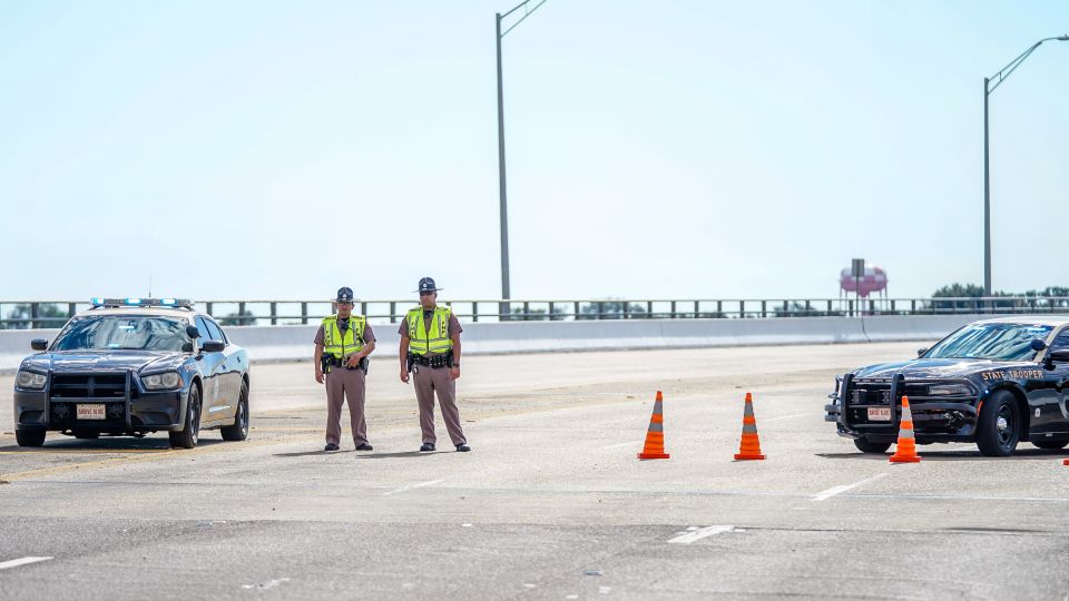 Florida Highway Patrol troopers block traffic over a bridge leading to the Pensacola Naval Air Station following a shooting on December 6, 2019. - Josh Brasted/Getty Images