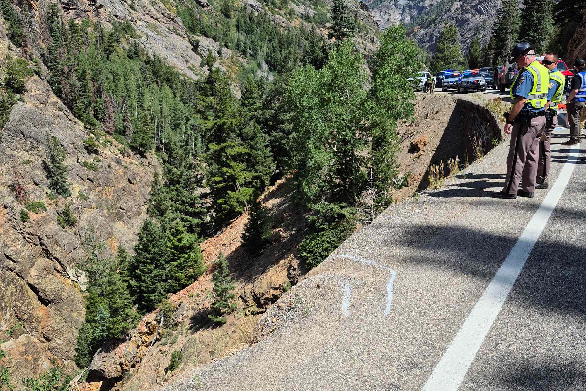 2 People Dead, 1 Child Rescued After Car Rolls More Than 300 Feet Down(00)