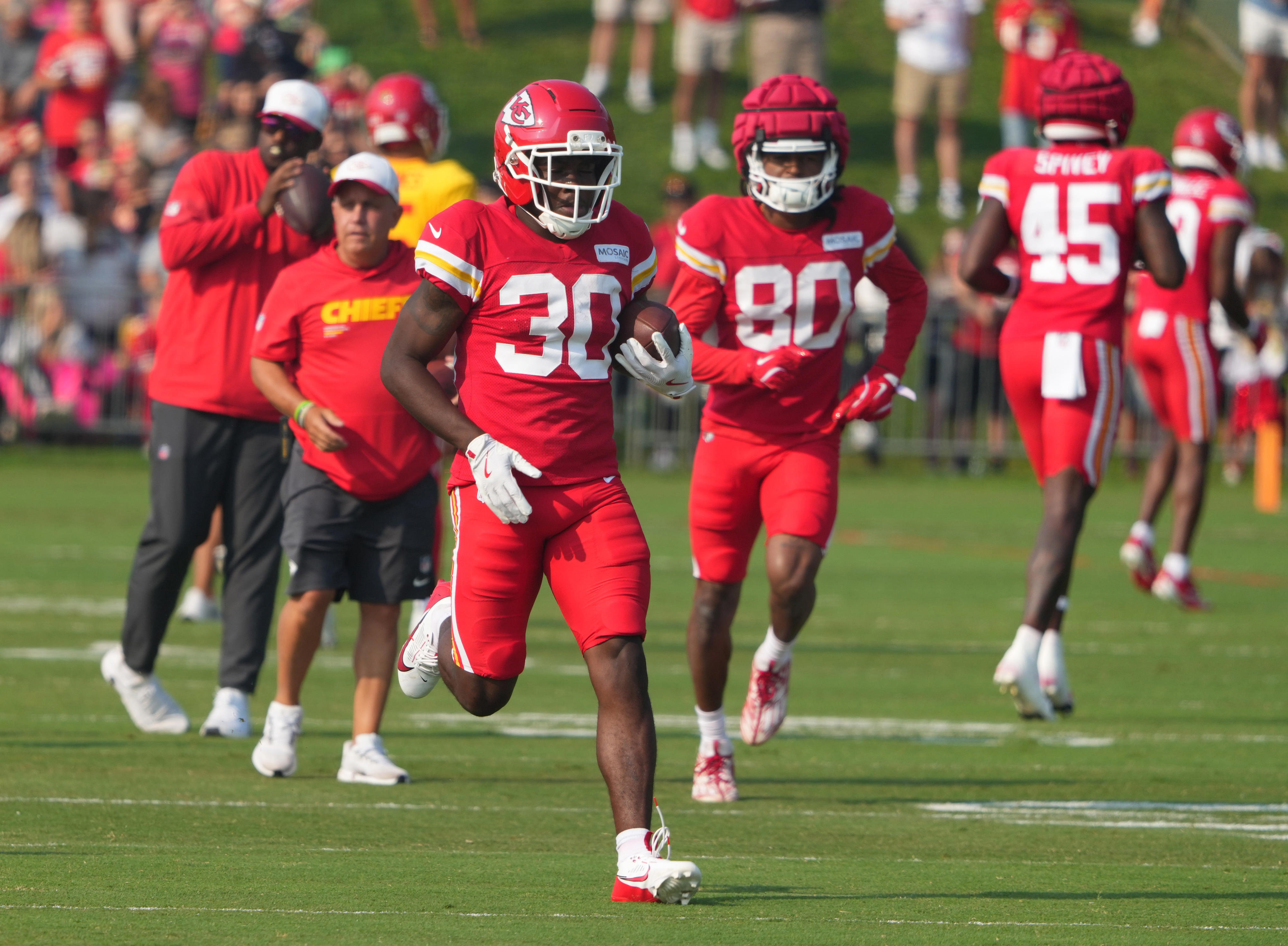 ST JOSEPH, MISSOURI - AUGUST 02: Brashard Smith #30 of the Kansas City Chiefs runs with the ball during training camp at Missouri Western State University on August 02, 2025 in St Joseph, Missouri. (Photo by Ed Zurga/Getty Images)