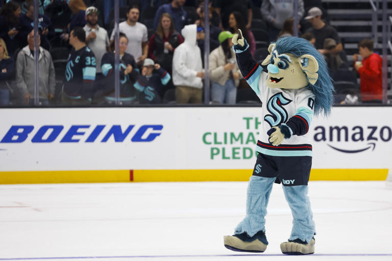 Seattle Kraken mascot gets chased by a bear during video shoot