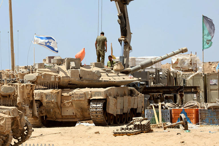 Israeli tanks stationed just outside of Gaza, Aug. 1.