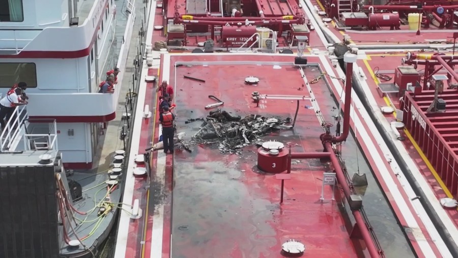 2 dead after helicopter crashes into Mississippi River barge north of