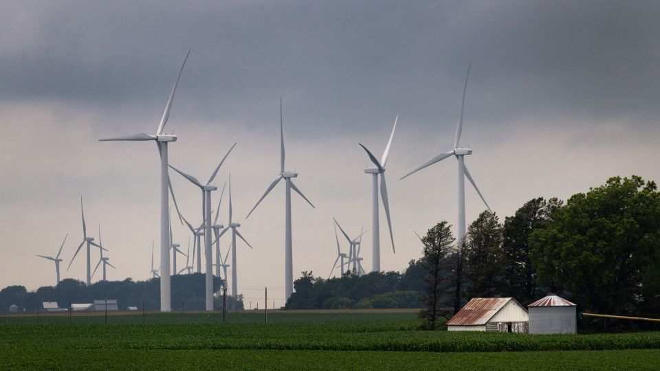 Power generating wind turbines tower over the rural landscape near Pomeroy, Iowa, on July 5. - Scott Olson/Getty Images