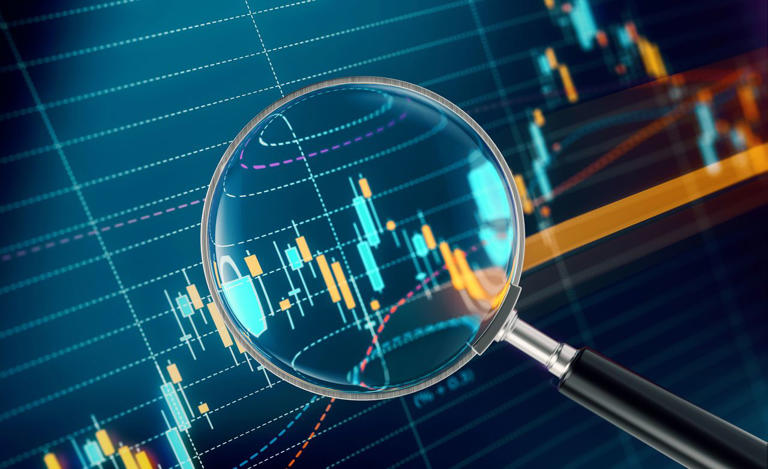 Magnifier focusing on a financial data analysis graph representing an investment fund's returns