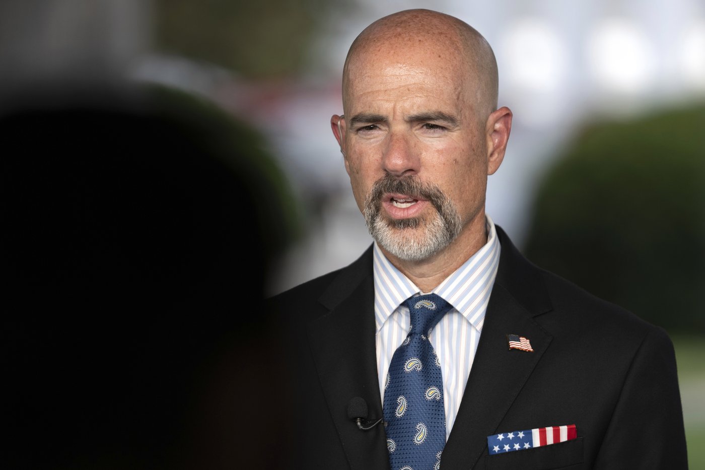 FILE - Drug Enforcement Agency Administrator Terrance Cole speaks during a television interview outside the White House, Aug. 12, 2025, in Washington. (AP Photo/Mark Schiefelbein, File)