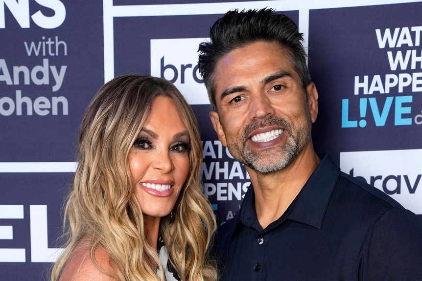 Tamra Judge and, husband, Eddie Judge smiling together.