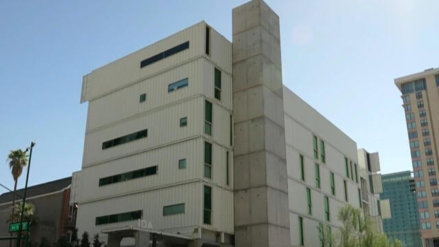 Transforming shipping containers into livable shelters