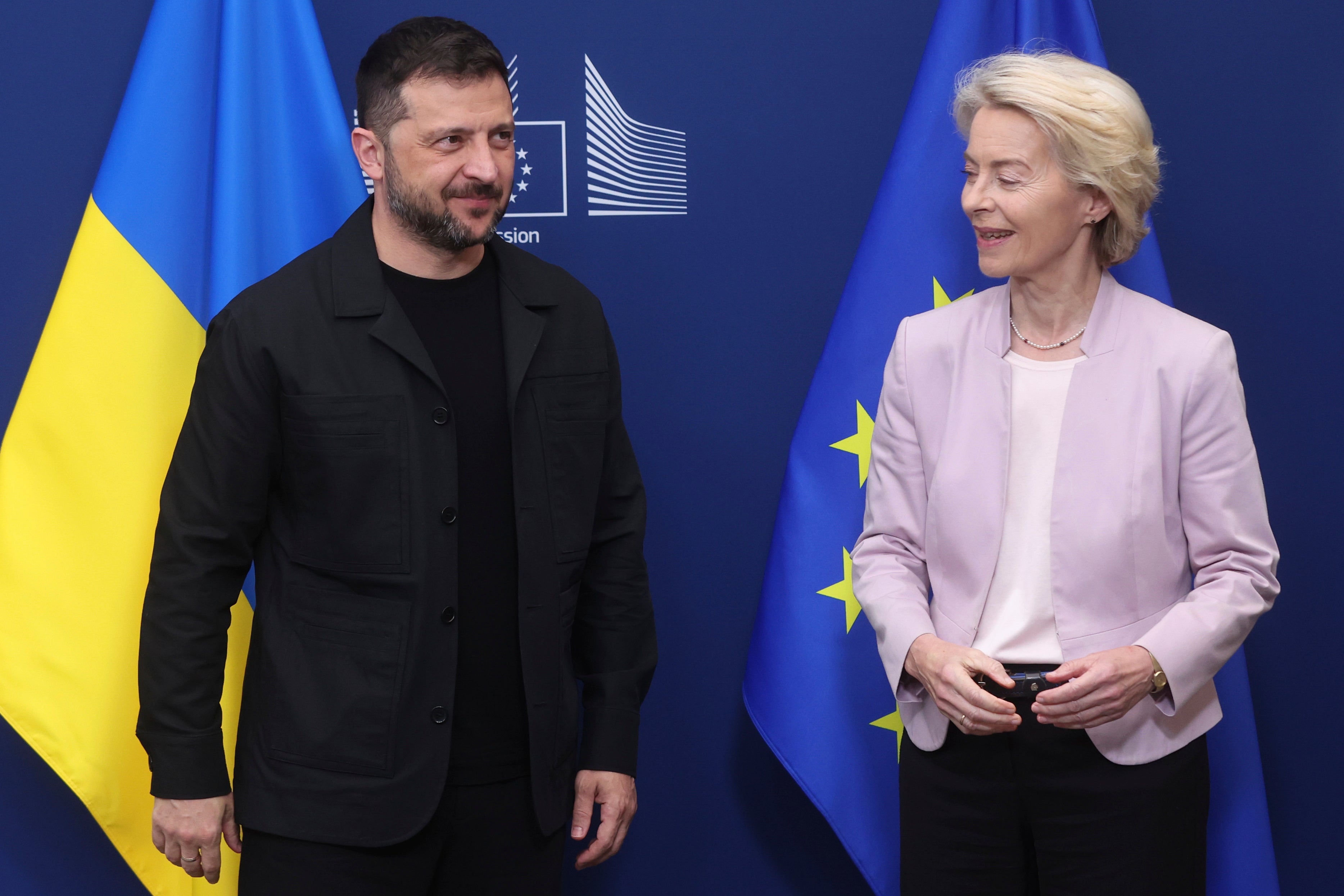 European Commission President Ursula von der Leyen greets Ukraine’s President Volodymyr Zelenskyy in Brussels on Sunday (AP)