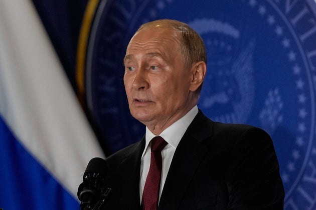 Russia's President Vladimir Putin speaks during a news conference with President Donald Trump at Joint Base Elmendorf-Richardson, Alaska, Friday, Aug. 15, 2025. (AP Photo/Julia Demaree Nikhinson)